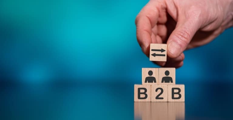 Concept of B2B with icons on wooden cubes